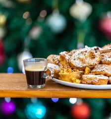 Authentic sweet Christmas French toast served with sugar and cinnamon in a Christmas atmosphere