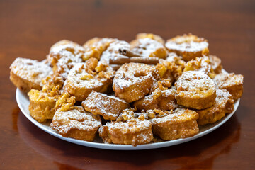 Authentic sweet Christmas French toast served with sugar and cinnamon in a Christmas atmosphere