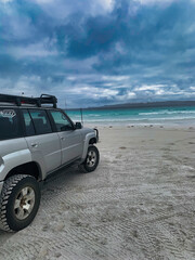 Off-Road SUV Parked on a Scenic Beach