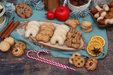 Table with various sweets and cookies for Christmas and Advent.