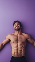 Fototapeta premium muscular shirtless man on purple background with copy space vertically 9:16