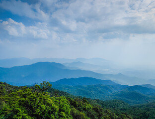 Fototapeta premium Vietnamese landscape with mountain scenery and shadows. Layers of mountains. Da Nang province, Vietnam. Aerial drone view