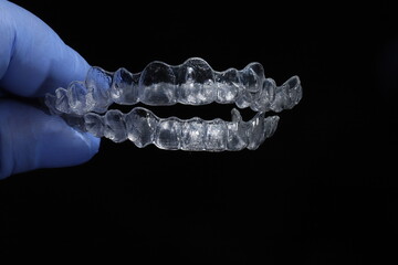 Clear aligner treatment used in dental dentistry and orthodontic treatments for the alignment of crooked teeth. Clear aligners are used in orthodontic treatment and bruxism treatment. © UniqDream