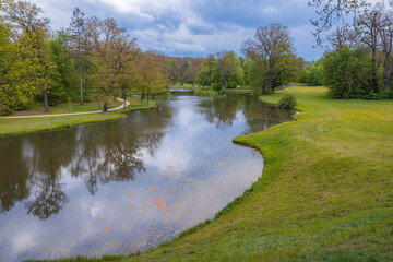 Serene Pond in Lush Spring Landscape