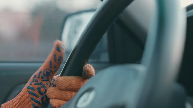 Tired Factory Worker in Safety Gloves Impatiently Tapping Steering Wheel, Frustrated Industrial Employee Taking Break in Car After Hard Shift