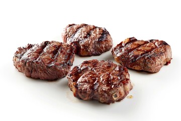 Obraz premium Freshly cooked steak patties served on a clean white plate, ready for serving