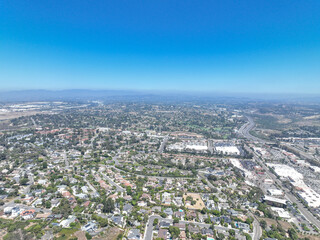 Obraz premium Aerial view of middle class houses in the valley of Oceanside town in San Diego, California. USA.