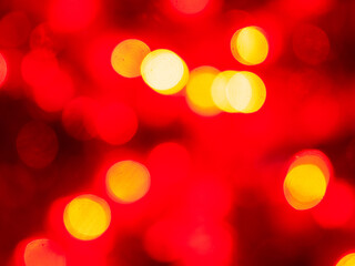 Defocused abstract red bokeh lights background for Christmas and New Year