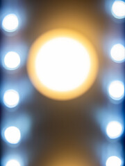 Abstract circular bokeh background, lights in the dark, defocused