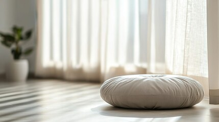 Meditation cushion in a calm indoor space with natural light and greenery