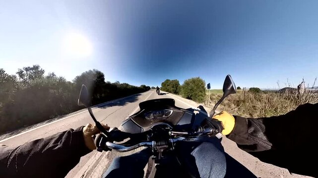 Video 4k p.o.v desde moto siguiendo a compa&ntilde;ero en moto por carretera secundaria 