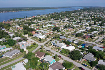 Aerial looking west toward the Halifax River (Intracoastal Waterway) over a Daytona Beach, Florida neighborhood.