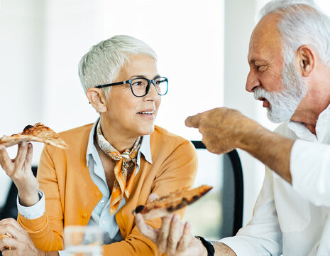 business meeting businesswoman woman office senior elderly businessman break pizza eating food man meal lunch friend friendship snack happiness fast italian hungry tasty teamwork - Powered by Adobe