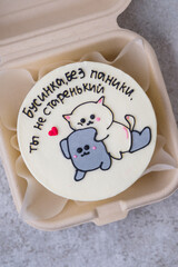 Bento cake as a gift for the holiday. Korean style cakes in a box for one person. Translation: Businka don not panic, you are not old