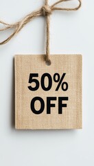 Minimalistic Top View of Square Wooden Price Tag with 50 Off Text, Isolated on White Background