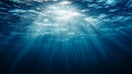 Fototapeta premium mesmerizing underwater scene showcasing the vastness of the deep sea. The sunlight pierces the azure abyss, symbolizing hope, mystery, and the unknown in a serene aquatic realm