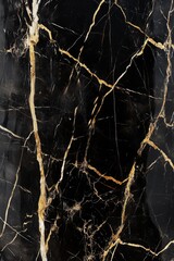 Close up shot of a black and gold marble, highlighting its texture and color