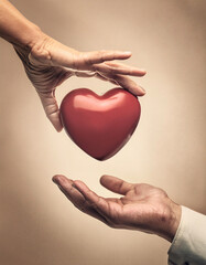 Fototapeta premium A pair of hands gently holds a red heart-shaped object, symbolizing care and compassion, with a soft beige background Generative AI