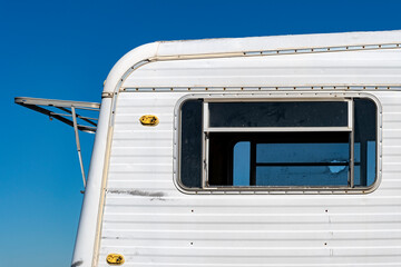An old recreational vehicle abandoned in a Texas field