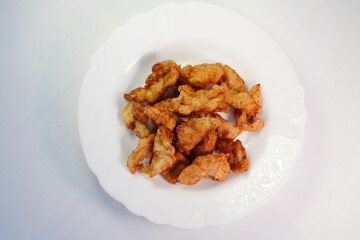 Fried pork pieces, ready to eat
