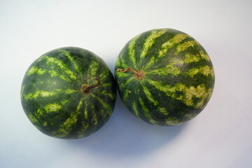 Two watermelons, ready to eat