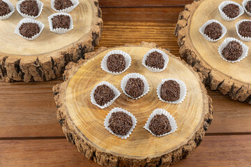 Brazilian chocolate truffle on wooden plates. Traditional Brazilian sweet_1.