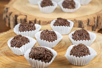 Brazilian chocolate truffle on wooden plates. Traditional Brazilian sweet_3.