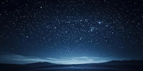 A serene night sky filled with countless stars over a dark landscape.