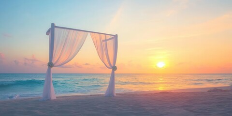 A serene beach setting with a draped arch during sunset, ideal for weddings or events.