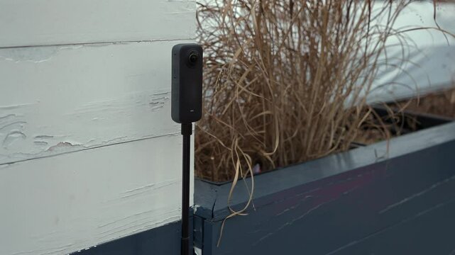 360 camera holding on a tripod