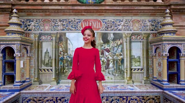 Ni&ntilde;a t&iacute;pica espa&ntilde;ola muy alegre con una sonrisa manda corazones y besos muy feliz. Desde la ciudad de Sevilla, Andaluc&iacute;a, Espa&ntilde;a, Europa.