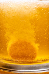 Effervescent Vitamin C Tablet Dissolving in Water