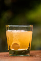 Effervescent Vitamin C Tablet Dissolving in Water