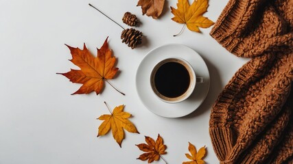 Cozy autumn flat lay with coffee and sweater