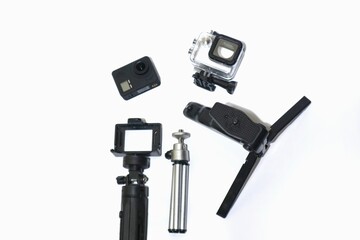 action camera with tripod accessory. isolated on white background