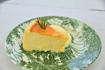Slice of Homemade Pineapple Cheesecake on Plate