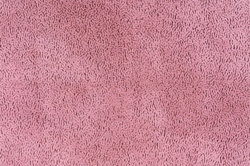 Pink color fabric cloth with short haired fluffy and soft abstract texture background. Close-up photo of crepe colored surface level textile material, background texture of fabric for design element