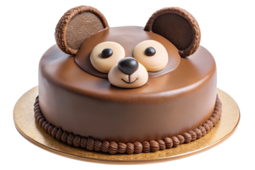 cute bear-shaped cake with chocolate ears and nose cut out isolated on white background