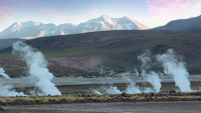 Distant View of Steaming Geysers at El Tatio, Atacama Desert at Sunrise, Chile - 4K