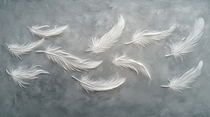 38.Gentle white feathers descending softly against a gray backdrop, with a subtle motion effect to capture the lightness of each feather in the air; the abstract composition evokes a sense of calm