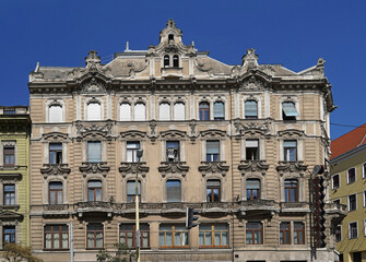 Grand baroque style facade of 19th century apartment building in Budapest