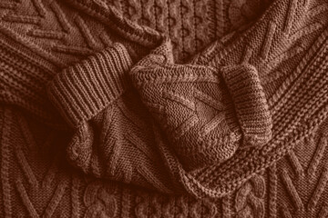 Mocha Mousse Background. Top view of soft warm textile texture with swirl of waves. Trendy color of year 2025 - Mocha Mousse. Abstract Background Textile