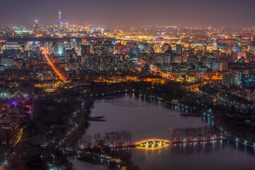 Fototapeta premium Overlooking Beijing city night view from CCTV tower 