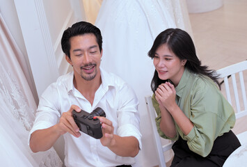 Lady happy picture on camera rear screen