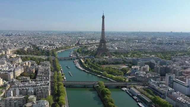 PARIS, FRANCE - OCTOBER 3, 2024: Stunning aerial view of Eiffel Tower and beautiful Seine River showcasing vibrant cityscape