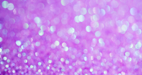 Defocused pink. Pearl powder. Small light flare spots of shining dust on lilac background. Changing violet glitter fairy luminosity.