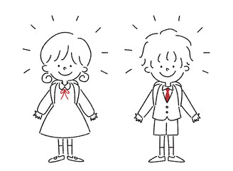 正面を向いて笑顔で立つ新一年生