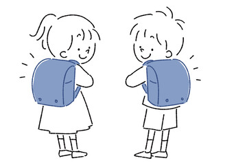 ランドセルを背負って振り向く後ろ姿の子供
