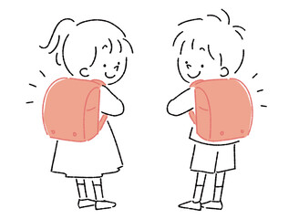 ランドセルを背負って振り向く後ろ姿の子供