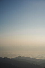 landscape and travel concept with sunrise and layer of mountain and mist with forest on morning